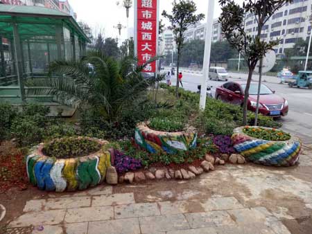 湖南婁底：廢棄輪胎“逆襲”成綠化新亮點