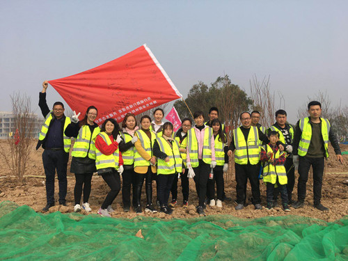陜西意景園林全員義務植樹用行動踐行綠色諾言