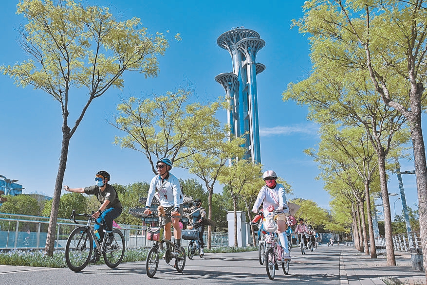 北京朝陽：林下騎行樂享繁花美景